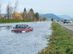 Water is slowly receding from the flood-devastated Sumas Prairie in Abbotsford on Dec. 3, 2021.