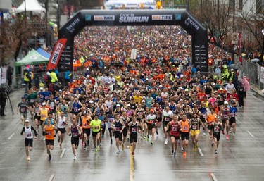 First group of runners take off as thousands participate in the 2023 Sun Run in Vancouver on April 16, 2023.