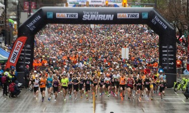First group of runners take off as thousands participate in the 2023 Sun Run in Vancouver on April 16, 2023.