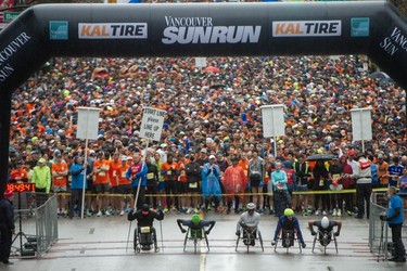 Wheelchair competitors are at the ready as thousands participate in the 2023 Sun Run in Vancouver on April 16, 2023.