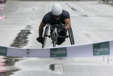 Leo Sammarelli wheels to the finish line in first place in the wheelchair division of the 2023 Sun Run in Vancouver on April, 16, 2023.