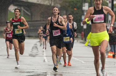 Cameron Pasternak runs to the finish of the 2023 Sun Run in Vancouver on April 16, 2023.