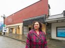 New Westminster Coun. Ruby Campbell in front of a vacant commercial property in the city. New West city council approved Campbell's proposal to bring a resolution to next month's Lower Mainland Local Government Association, asking the province to empower municipalities to tax vacant commercial properties.