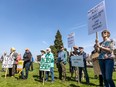 Protesters gather in front of the Legislature in Victoria April 27. Protesters also gathered in Surrey, Nanaimo, Prince George, Dawson Creek, Penticton and Kamloops.