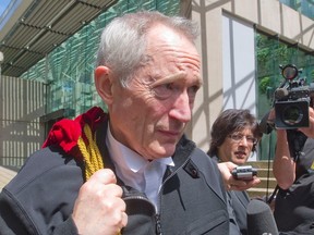 Lawyer Michael Bolton speaks with reporters outside the B.C. Supreme Court house in 2010.