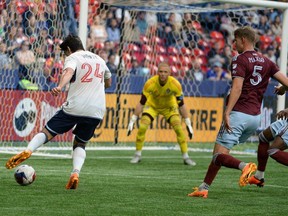 Vancouver Whitecaps FC forward Brian White controls the ball against Colorado Rapids defender Andreas Maxso during the first half at B.C. Place Apr 29, 2023.