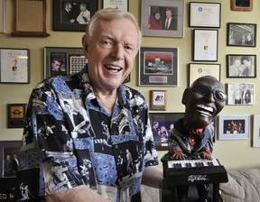 Red Robinson with memorabilia from over the years including this Ray Charles singing and head bobbing model, photographed here in Vancouver on July 28, 2009.