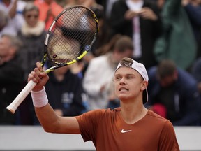 Holger Rune of Denmark waves to spectators after winning the final match against Botic Van De Zandschulp of the Netherlands at the Tennis ATP tournament in Munich, Germany, Sunday, April 23, 2023. Rune is joining Stefanos Tsitsipas of Greece and Andrey Rublev of Russia on captain Bjorn Borg's Team Europe for this year's Laver Cup in Vancouver.
