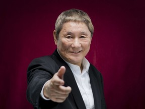 FILE - Japanese director Takeshi Kitano poses for portraits for the film "Outrage Coda" at the 74th edition of the Venice Film Festival in Venice, Italy on Sept. 8, 2017. Kitano's new film, premiering at the Cannes Film Festival May, 2023, is a samurai story without heroes, mercilessly portraying human greed, betrayal and cruelty.
