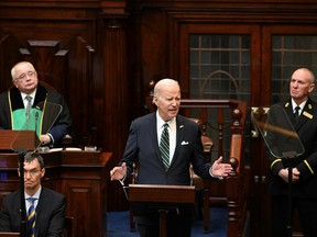 U.S. President Joe Biden addresses the Houses of the Oireachtas at Leinster House, Dublin, Ireland, April 13, 2023. Kenny Holston/Pool via REUTERS