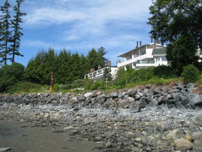 Sooke Harbour House overlooking Whiffen Spit Beach on Vancouver Island.