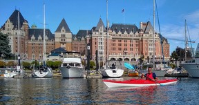 The Fairmont Empress Hotel is a dramatic backdrop to a Victoria harbour paddle.