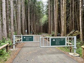 Pacific Rim National Park Reserve trilingual welcome to multi use pathway.