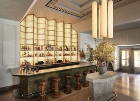 3000 pound solid cast bronze bar by New Format Studio for Le Rock, a restaurant in Rockefeller Plaza, New York.