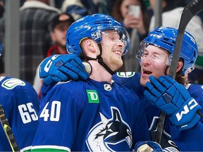 Canucks centre Elias Pettersson had a lot to celebrate this NHL season with Brock Boeser.
