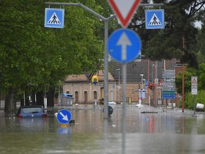 A flooded street is pictured in Cesena on May 17, 2023 after heavy rains caused major floodings in central Italy.