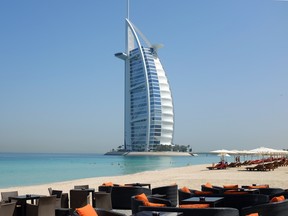 A picture taken on May 14, 2015 shows a view of Dubai’s Burj al-Arab hotel seen from the Mina al-Salam beach hotel and touristic resort in Jumeirah.