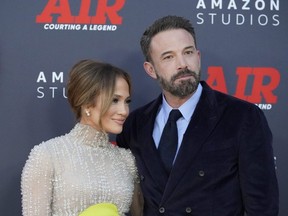 Jennifer Lopez and Ben Affleck arrive at the world premiere of "Air," Monday, March 27, 2023, at the Regency Village Theatre in Los Angeles.