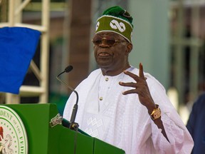 Nigeria's President Bola Ahmed Tinubu speaks after taking an oath of office at a ceremony in Abuja, Nigeria, on Monday.