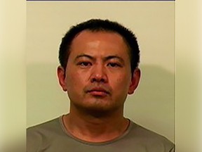 Cheng Huang, 47, is wanted Canada-wide on numerous fraud charges, as well as forgery, threats and firearms offences in Vancouver.