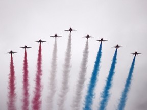 Red Arrows fly over following King Charles and Queen Camilla's coronation in London, Britain May 6, 2023. REUTERS/Yara Nardi/Pool