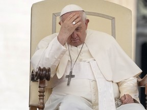 Pope Francis pauses during his weekly general audience in the St. Peter's Square at the Vatican, Wednesday, May 17, 2023.