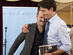 Prime Minister Justin Trudeau with his brother Alexandre, who was presenting his book Barbarian Lost during a Literary Luncheon presented by the Ottawa International Writers Festival on Sept. 13, 2016.