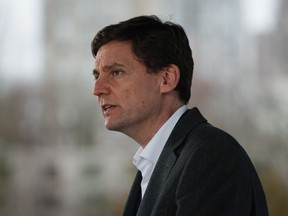 B.C. Premier David Eby speaks during a news conference in Vancouver on Feb. 5, 2023.