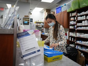 Pharmacist Cathy Wang at the 360Care Denman Pharmacy in Vancouver, B.C.