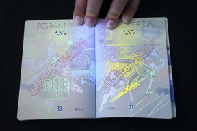 The new Canadian passport is unveiled at an event at the Ottawa International Airport in Ottawa on Wednesday, May 10, 2023.