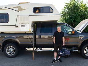 Glen Henderson and pup Miley at the Cole Road rest area in Abbotsford. Henderson moved into his camper when he couldn't find affordable housing.