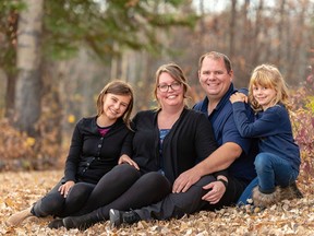 Handout photo of Jamie Thompson and family. L-R: Daughter,Parker (13), Jamie Thompson, Ron Thompson, daughter, Lily (9).