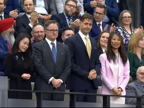 While many former hostages have made their agonizing stories public, the two Michaels have remained silent. (Photo: Michael Spavor and Michael Kovrig  receive applause in the House of Commons prior to an address by the President of the U.S. on March 24, 2023.)