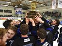 The Wenatchee Wild hold up the Doyle Cup as they celebrate defeating the Spruce Grove Saints 7-2 during game 5 of the Doyle Cup at Grant Fuhr Arena in Spruce Grove, May 4, 2018. Ed Kaiser/Postmedia