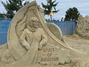 sand sculpture of male aviator