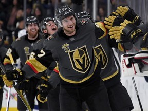 Golden Knights defenceman Shea Theodore gets the fist bumps after showing an offensive flair during the club's inaugural NHL season.