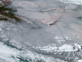 Wildfires and smoke are shown in British Columbia and Alberta in this satellite image taken last month.