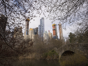 FILE - Skyscrapers overlook Central Park and Gapstow Bridge, April 17, 2018, in New York.
