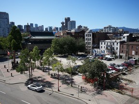 A parking lot that is the proposed site of a condo development in Chinatown is seen in Vancouver, on Tuesday, June 6, 2023. The nondescript lot at 105 Keefer Street is at the centre of debate about the future of Vancouver's historic Chinatown.
