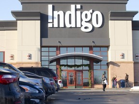 Customers leave an Indigo store in London, Ont., on Nov. 29, 2013.