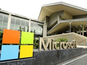In this July 3, 2014, file photo, the Microsoft Corp. logo is displayed outside the Microsoft Visitor Center in Redmond, Wash.