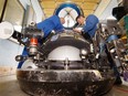 In a file photo, Jeff Heaton, operations manager and chief submersible pilot for the pioneering North Vancouver research company founded by the late Phil Nuytten, prepares a small sub to map out the site of sunken ferry near Prince Rupert in 2006.