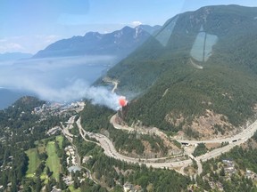 A grass fire near Horseshoe Bay has forced the closure of Highway 99 in both directions.