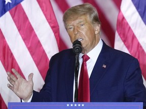 Donald Trump speaks as he announces a third run for president