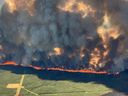 Aerial view of the Donnie Creek Wildfire is shown in this handout image provided by the B.C. Wildfire Service. The B.C. Wildfire Service says there are 83 active wildfires in the province. THE CANADIAN PRESS/HO-B.C. Wildfire Service