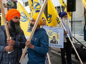 Approximately 200 people protest outside the Indian consulate in Vancouver, B.C. on June 24. Calling for an independent Sikh state within India called Khalistan, the protest focused on the killing of Sikh independence leader Hardeep Singh Nijjar in Surrey.