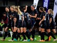 New Zealand players celebrate a goal during the women's international friendly football match against Vietnam.