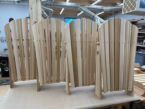 Pieces of the Adirondack chairs made by Tofino Woodshop.