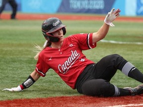 Victoria Hayward of Team Canada slides into third base in the third inning during the women's bronze medal softball game between Team Mexico and Team Canada on day four of the Tokyo 2020 Olympic Games.
