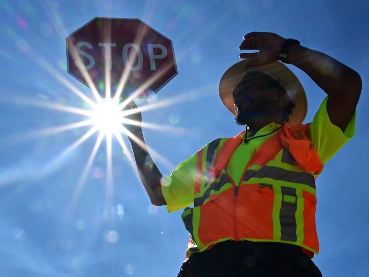  File photo of a traffic warden under the hot sun in Las Vegas, where temperatures reached 41.2 C last summer during a heatwave.